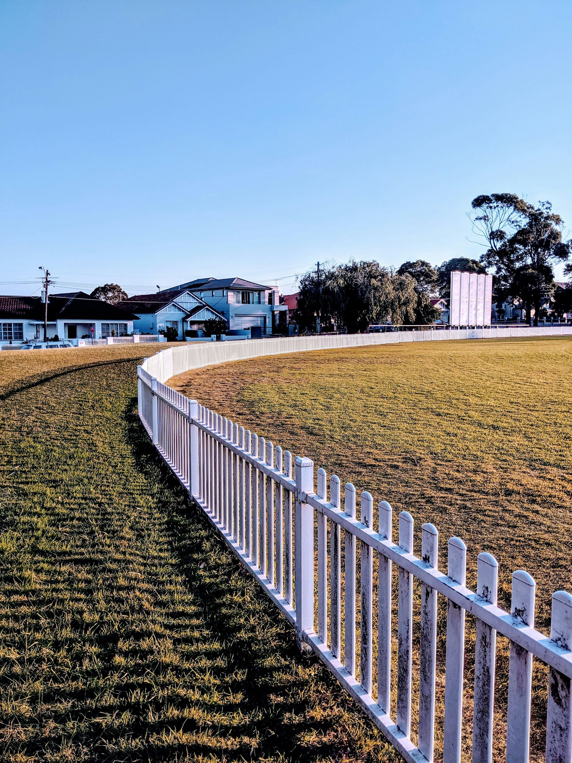 white wooden fence